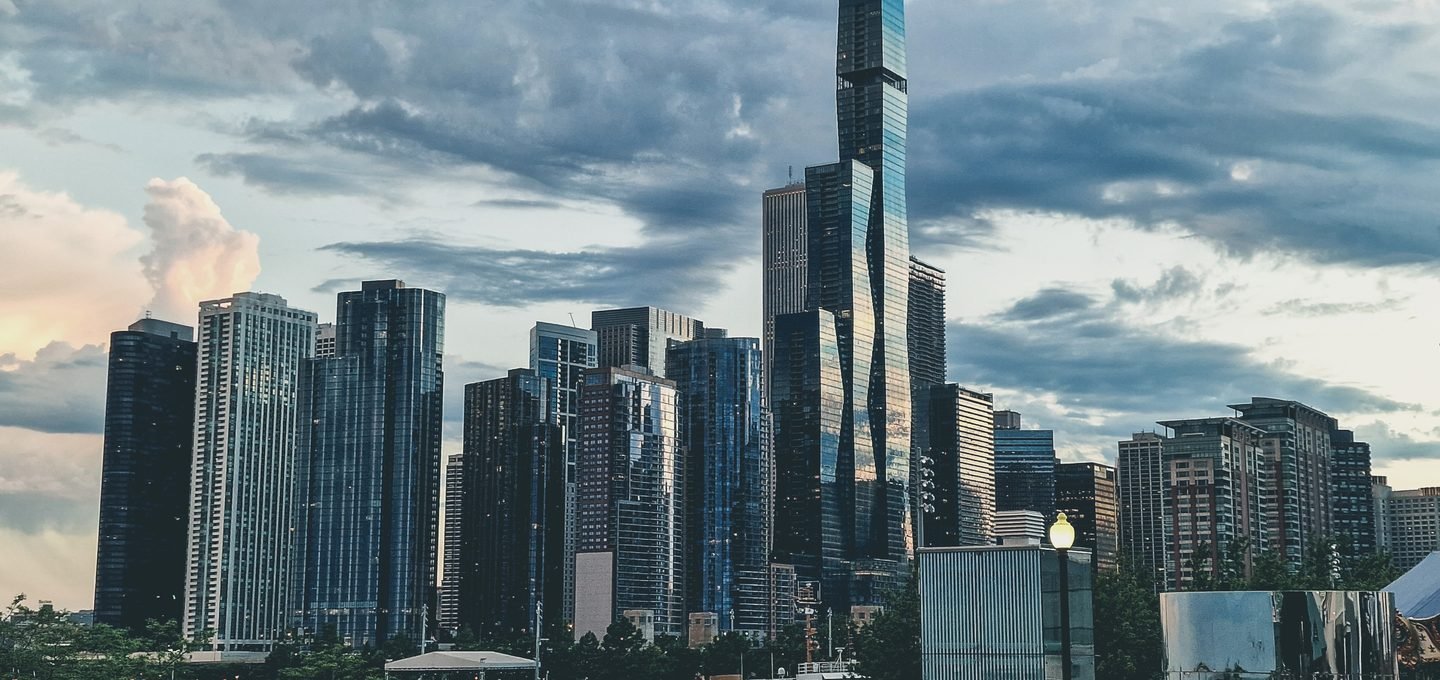 The Chicago skyline and St Regis tower under dramatic clouds